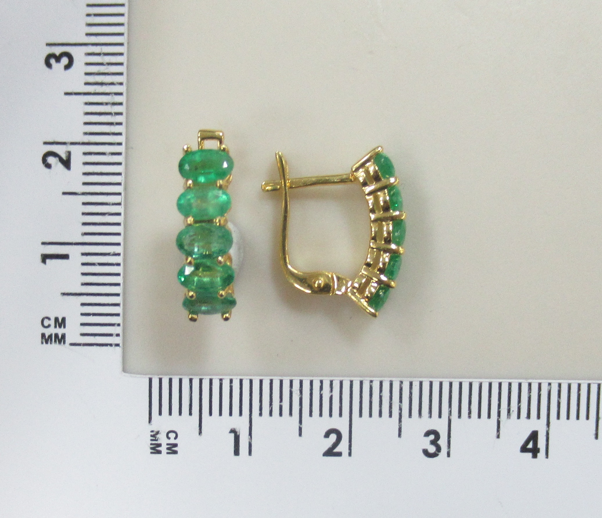 Серебряные серьги с изумрудами